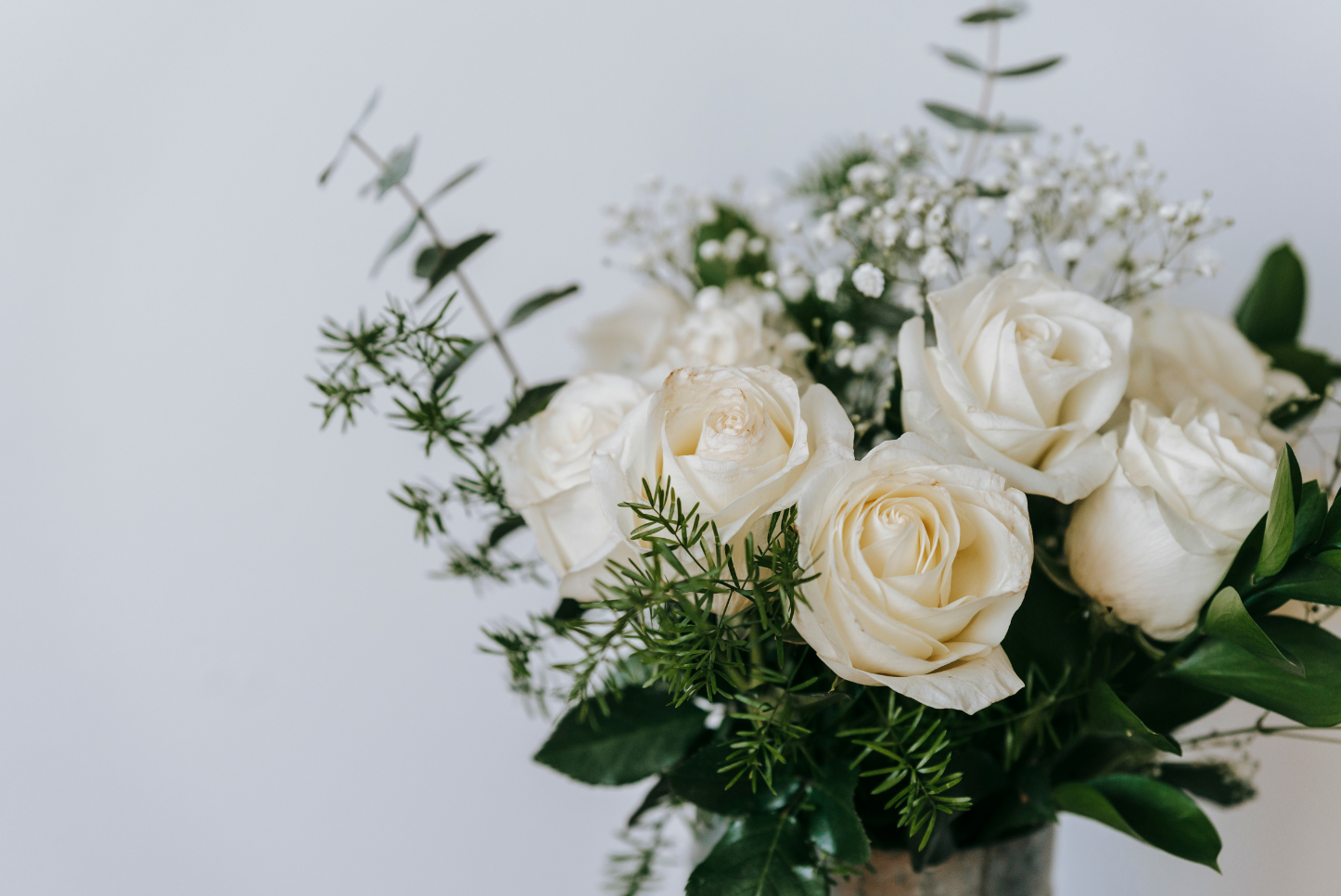 White roses and greenery